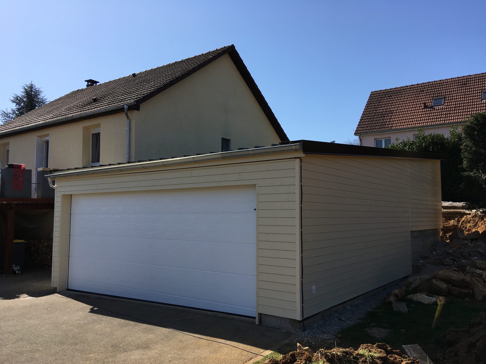 Garage bois sur mesure réalisé par Tonnaire — réalisation 24