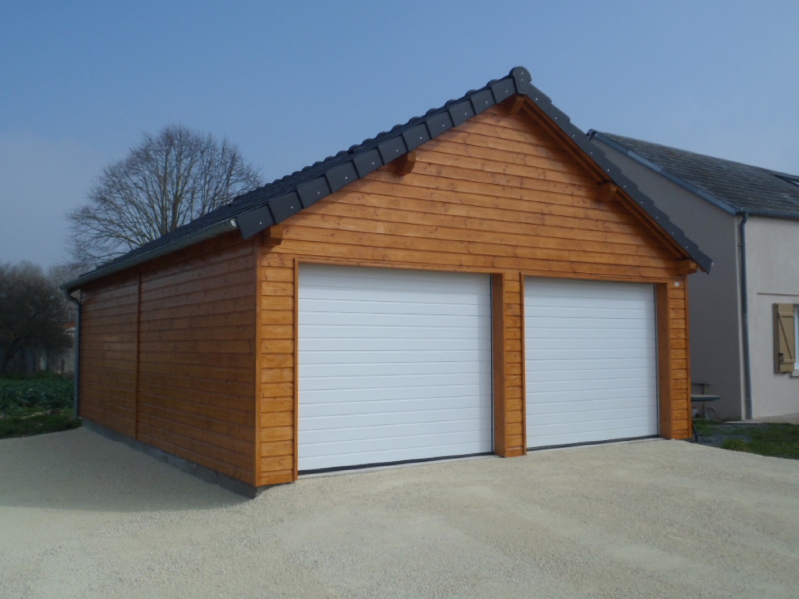 Garage bois sur mesure réalisé par Tonnaire — réalisation 26