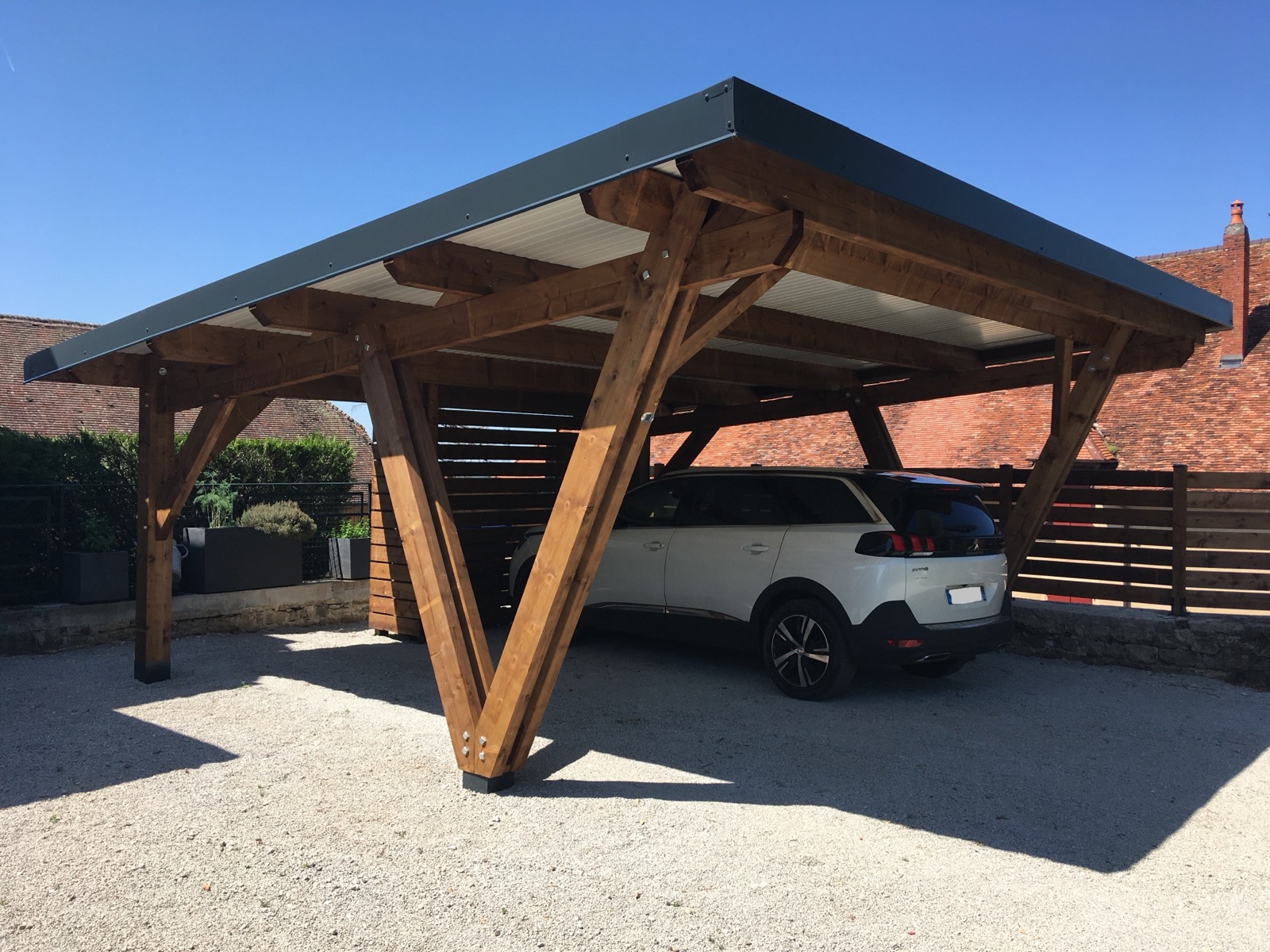 Carport bois sur mesure réalisé par Tonnaire — réalisation 4