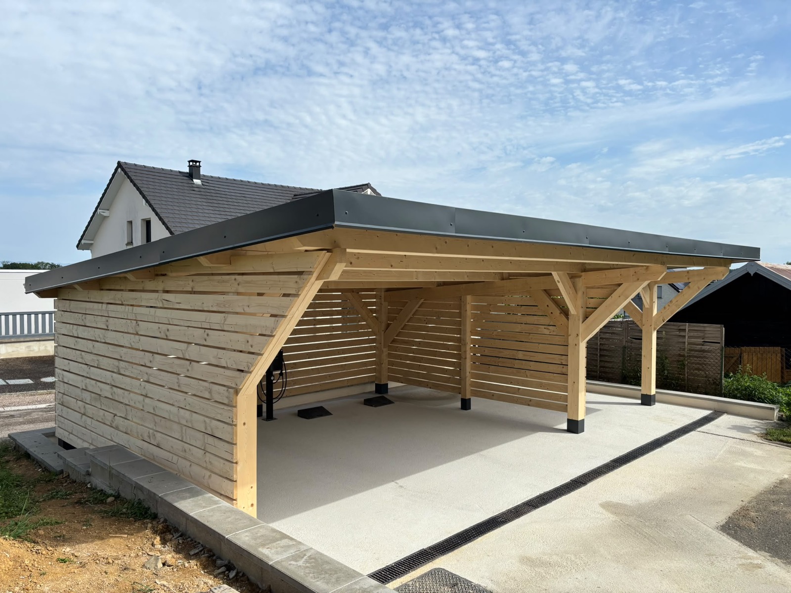 Carport bois sur mesure réalisé par Tonnaire — réalisation 13
